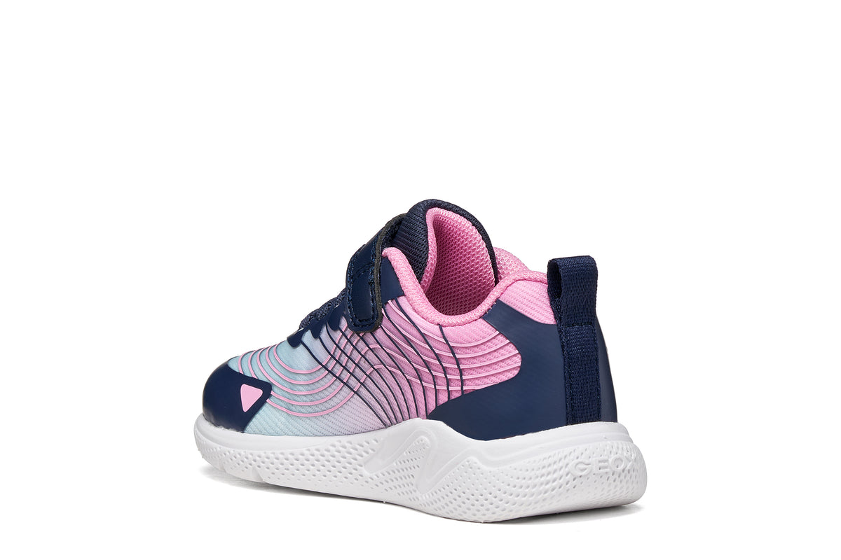 Geox girls trainer in the style Sprintye in purple and pink, with a Velcro strap and white sole. Angled back view of rightside shoe.