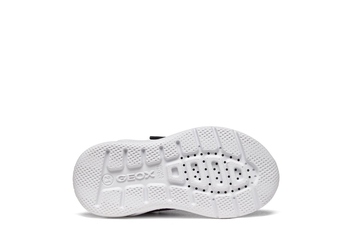 Geox girls trainer in the style Sprintye in purple and pink, with a Velcro strap and white sole. View of sole.