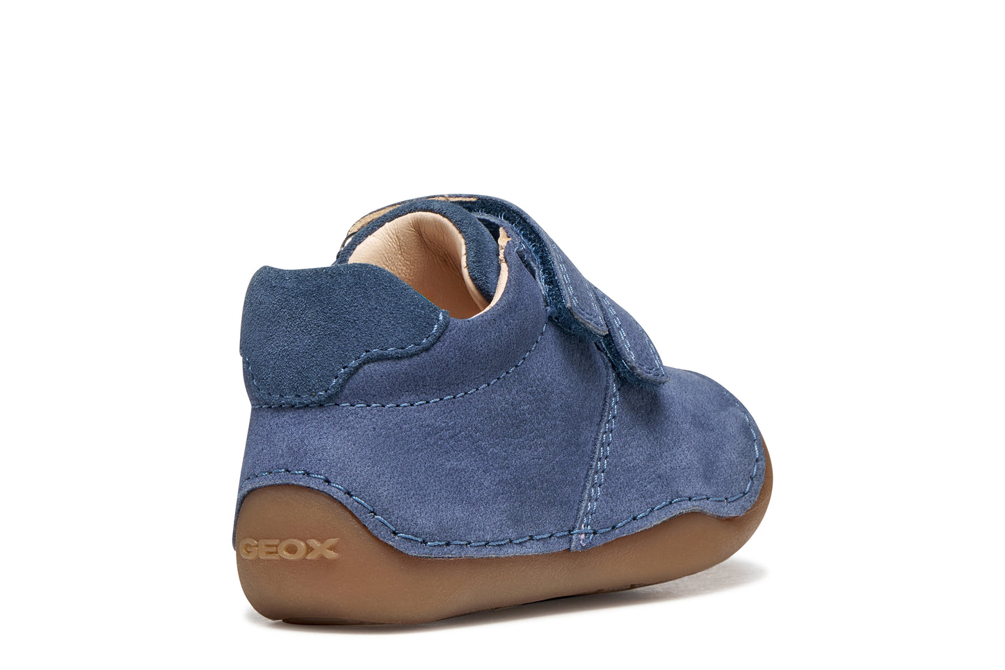 Geox pre-walker shoe in the style Tumtim, in the colour denim blue with a double Velcro strap fastening and gum sole. Angled back view of outer right side shoe.