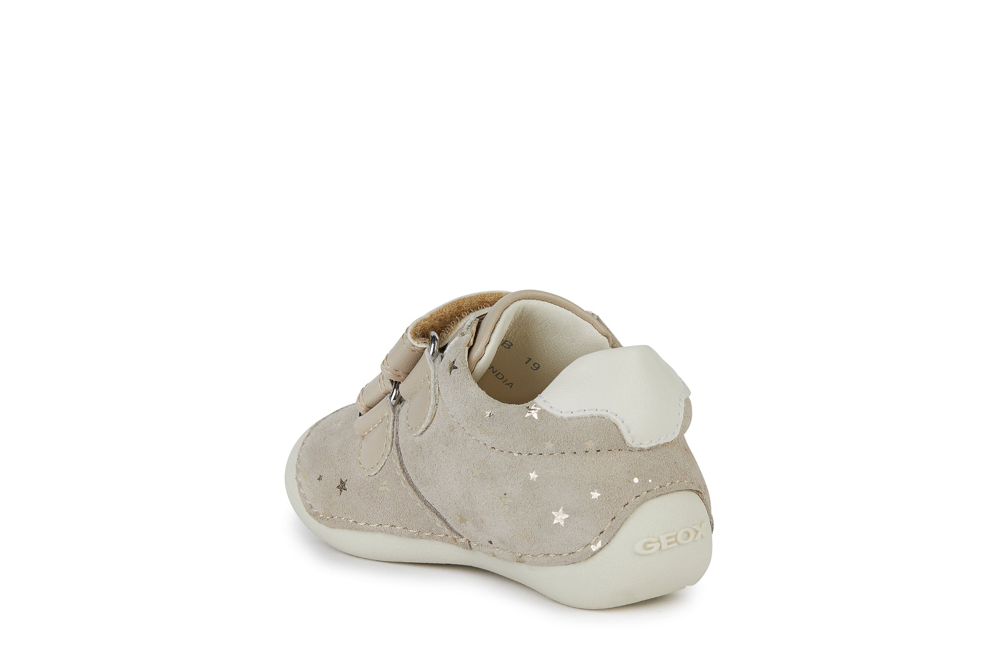 A girls pre walker by Geox, style B Tutim Girl, with toe bumper ,in beige suede with star detail and double velcro fastening. Angled view of left side.