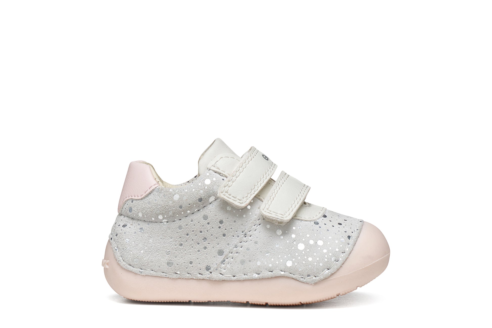 A girls pre-walker shoe by Geox, style Tutim in white/pink with silver speckled design, two velcro straps and toe and heel bumpers. Right side view