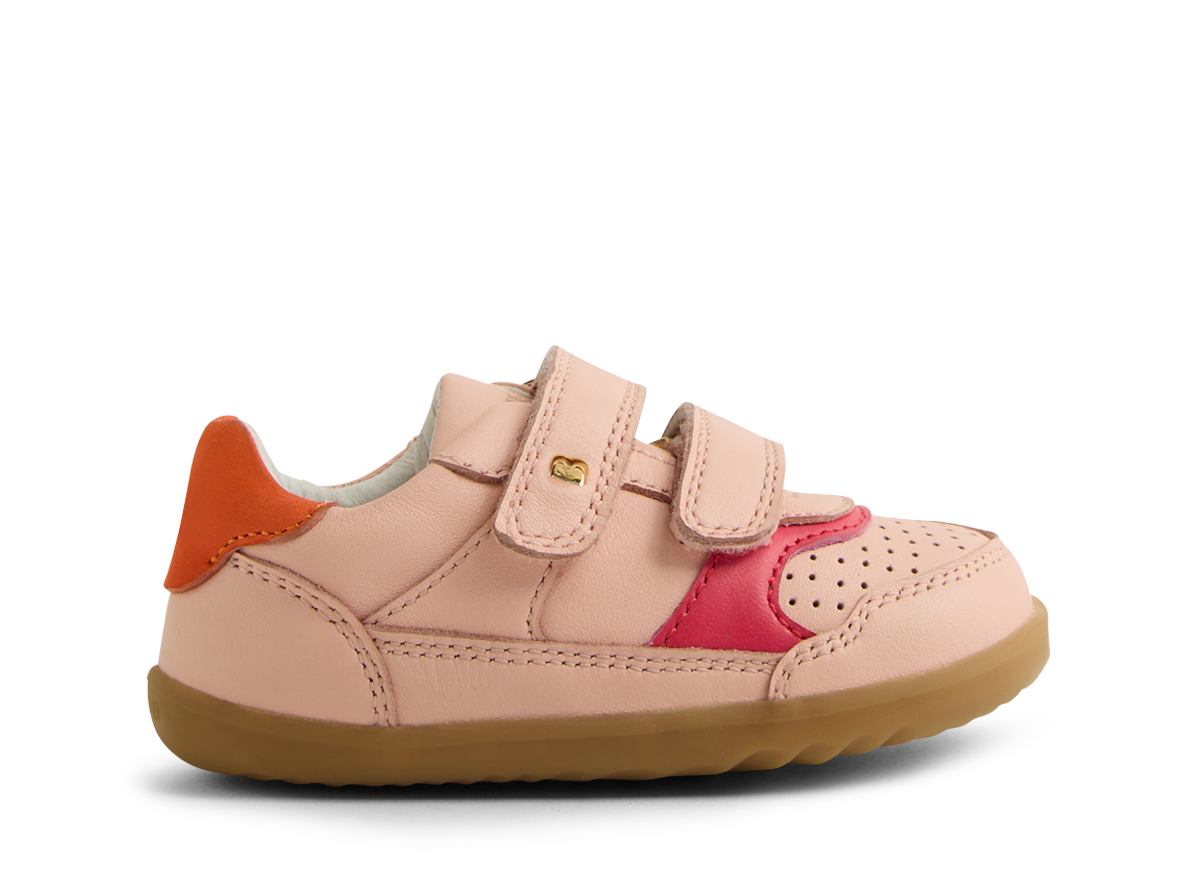 A girls casual shoe by Bobux, style Hunter in pink with bright pink and orange trim and velcro fastening. Right side view.