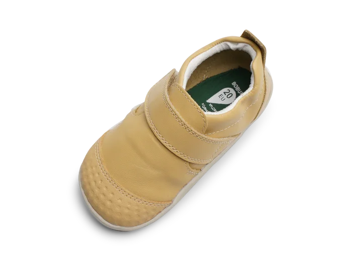 A unisex pre-walker by Bobux, style XP Go, in sand with velcro strap. Above view.