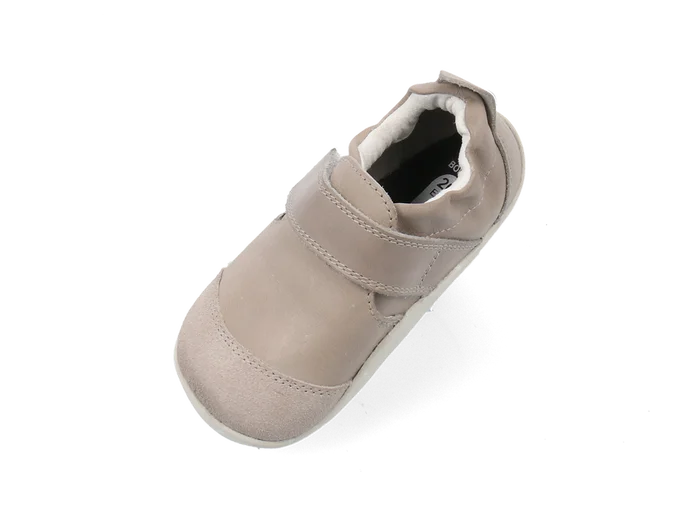 A unisex pre-walker by Bobux, style XP Marvel, in taupe leather and suede with velcro strap. Above view.