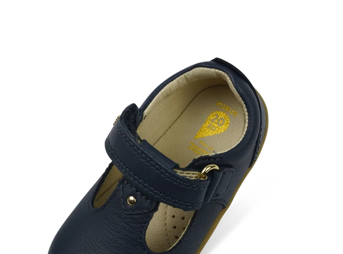 A unisex first shoe by Bobux, style Louise, a velcro T-bar in navy. Above view.
