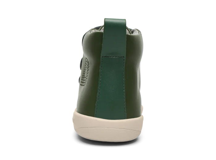 A boys casual boot by Bobux, style Hi-Court, in forest green with three velcro straps on a white sole. View of the back.