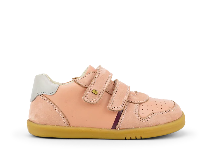 A girls casual full shoe by Bobux, style Riley, double velcro in dusky pink leather and suede. Side view