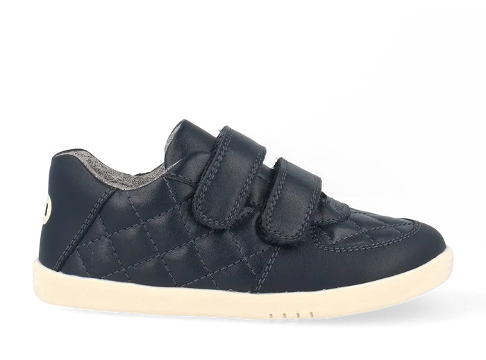 A boys casual shoe by Bobux, style Stitch, in navy leather ,with stitch detail and double velcro fastening. Right side view.