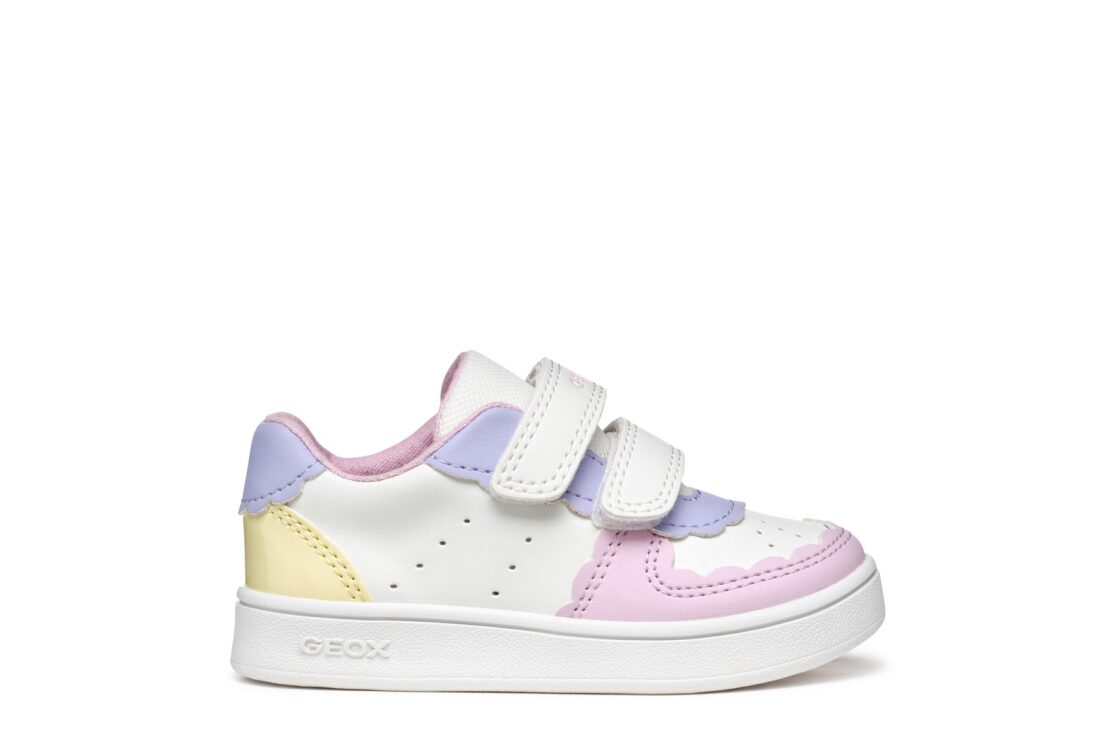 A girls casual shoe by Geox, style B Eclyper in white/lt yellow, with double velcro fastening. Right side view.