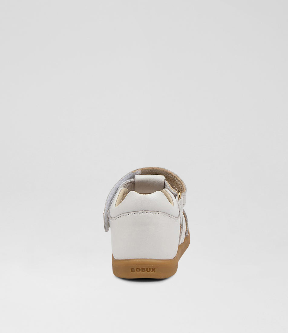 A unisex sandal by Bobux, style Cross Jump in white with velcro strap and light brown sole. Back view