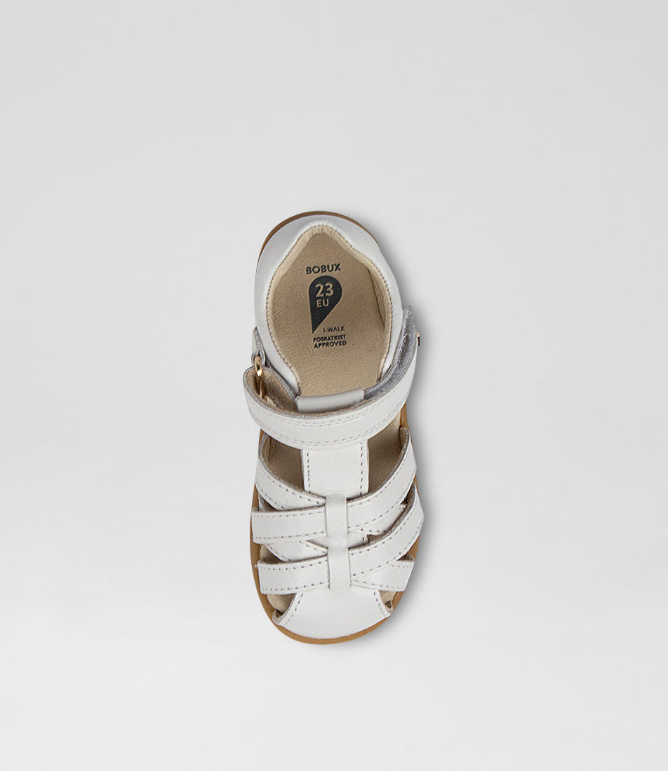 A unisex sandal by Bobux, style Cross Jump in white with velcro strap and light brown sole. Top view