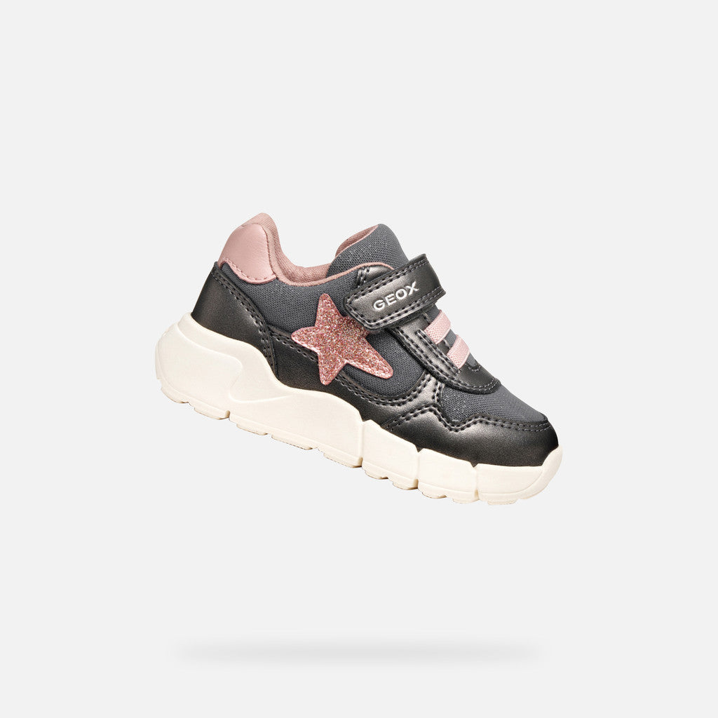 A girls casual trainer by Geox, style B Flexyper Mini B566NB, in grey with pink glitter star to side and pink trim. Velcro fastening. Angled right side view.