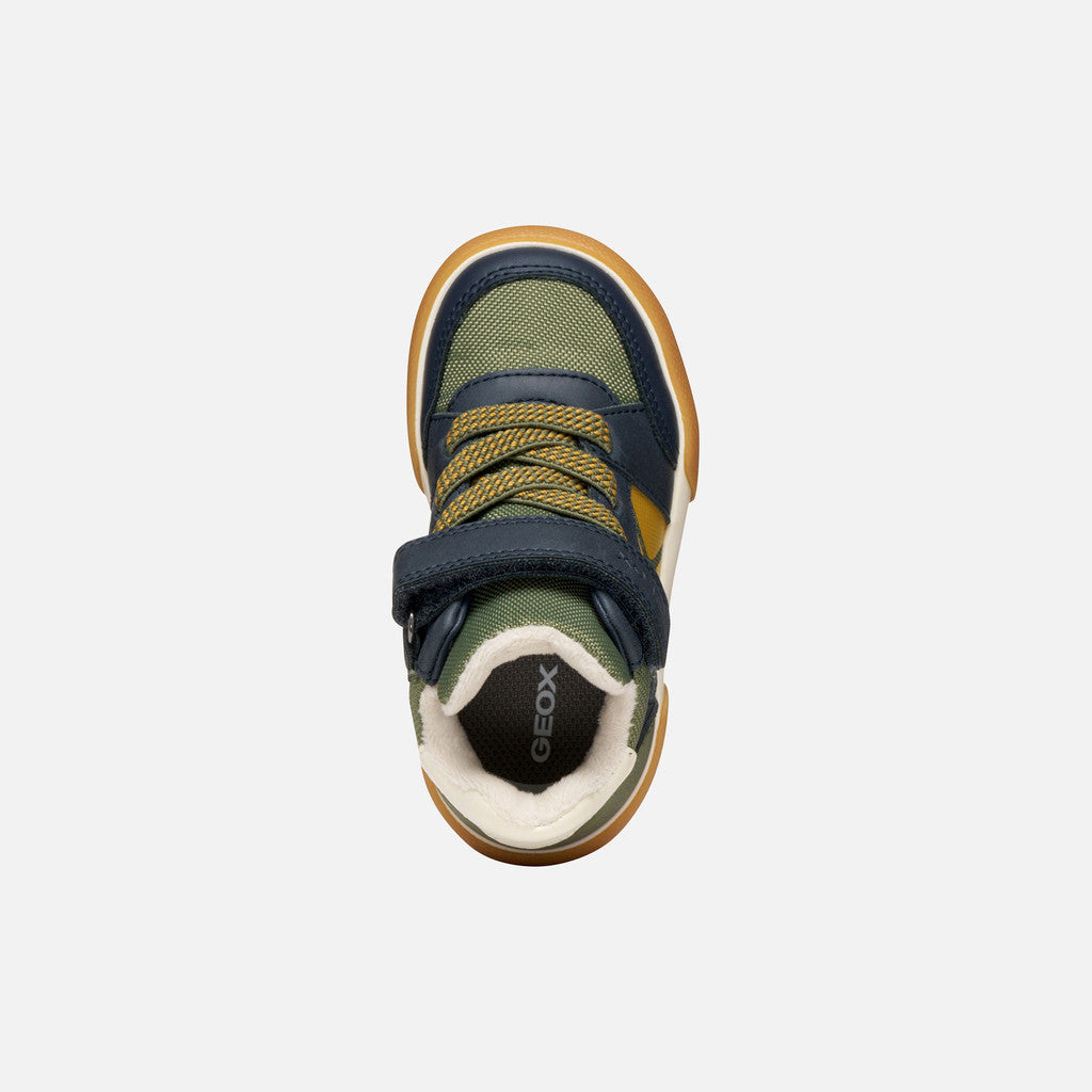 A boys ankle boot by Geox, style Gisli Boy A, in military/navy with velcro strap and green/yellow laces. Right top view