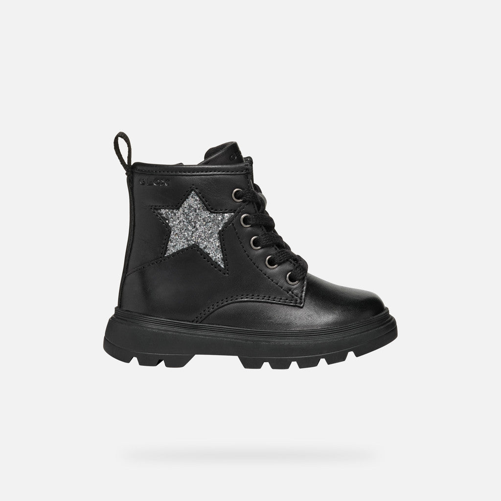 A girls chunky boot by Geox, style B465YA Kiddartah, in black with silver glitter star detail. Zip and lace fastening. Right side view.