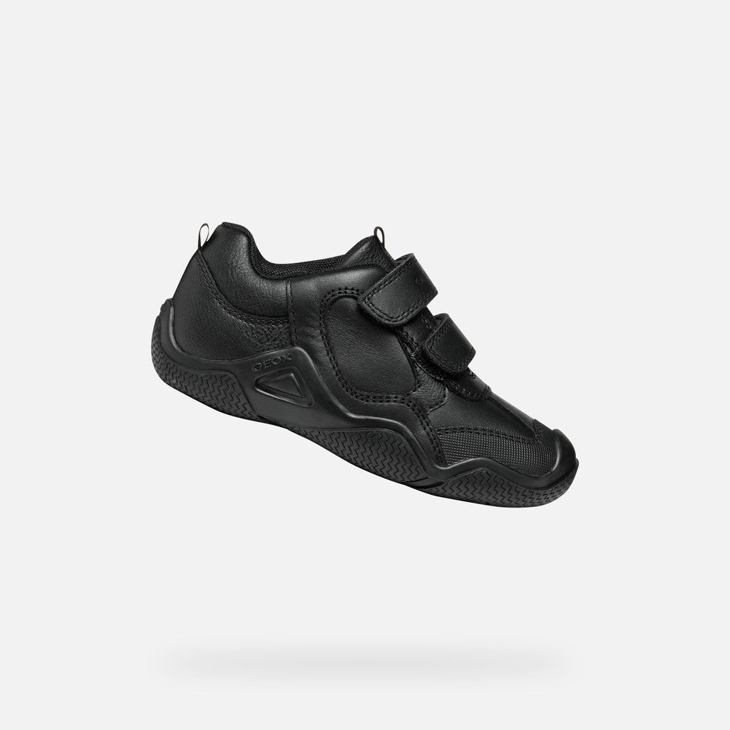 A boys school shoe by Geox, style Wader in black leather with two velcro straps and toe and heel bumpers. Tilted right side view