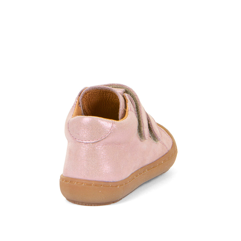  A girls ankle boot by Froddo, style Ollie G2130308-10, in pink shimmer nubuck leather with toe bumper. Double velcro fastening. Angled back view.