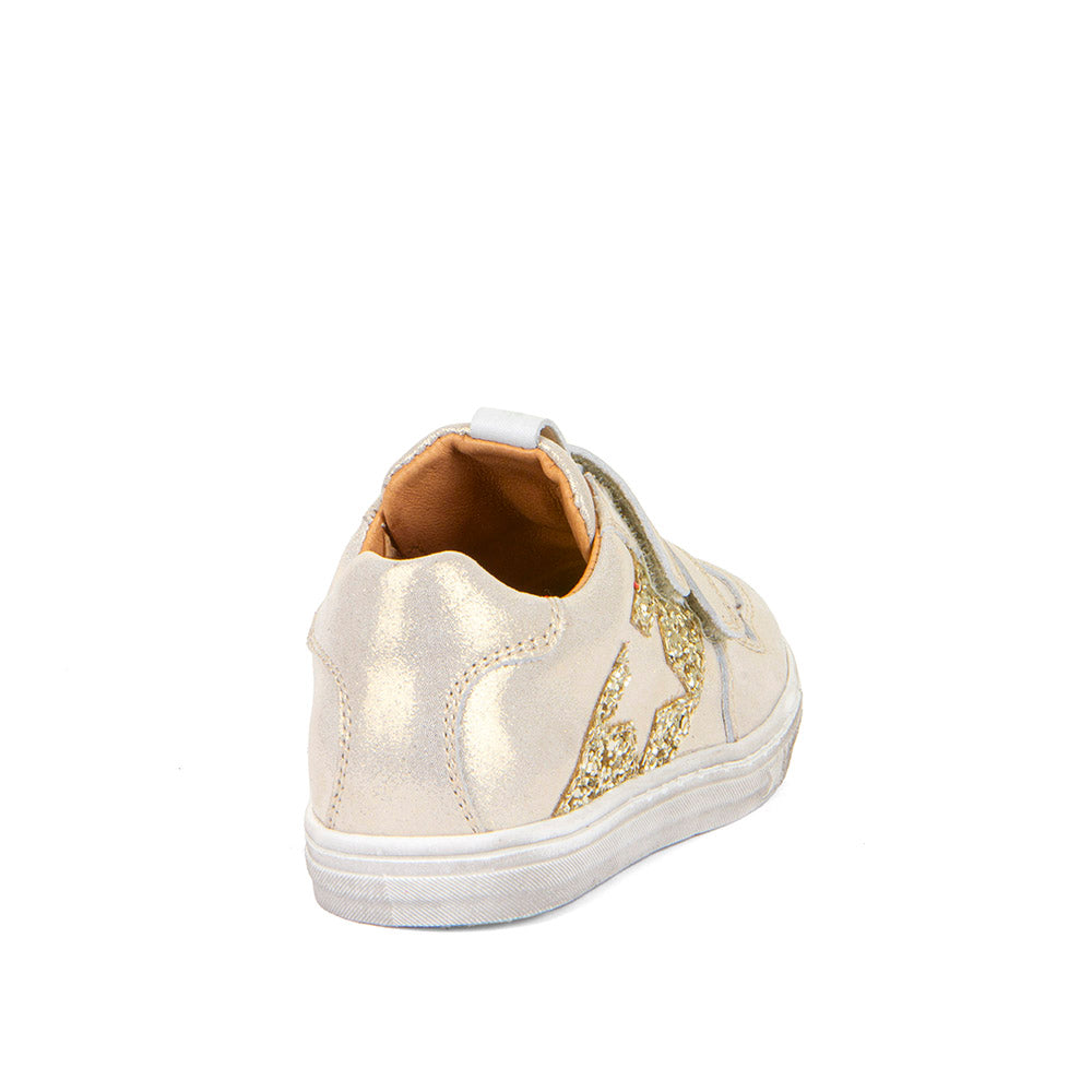 A girls casual occasion shoe by Froddo, style G2130315-11 Dolby, in light gold metallic with gold sequin block and star detail, double velcro fastening. Back view.