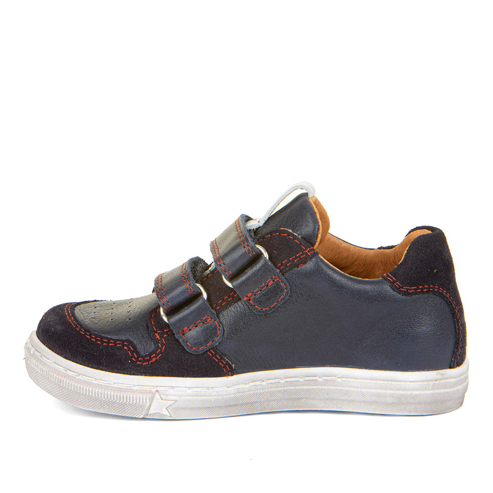 A boys casual shoe by Froddo, style G2130315 Dolby, in navy with orange block and star detail, double velcro fastening. Left side view.