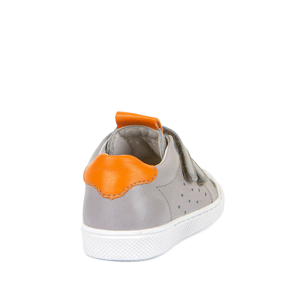 A boys casual shoe by Froddo, style Rosario G2130316-15, in grey leather with orange trim and toe bumper. Velcro fastening. Angled view of back.