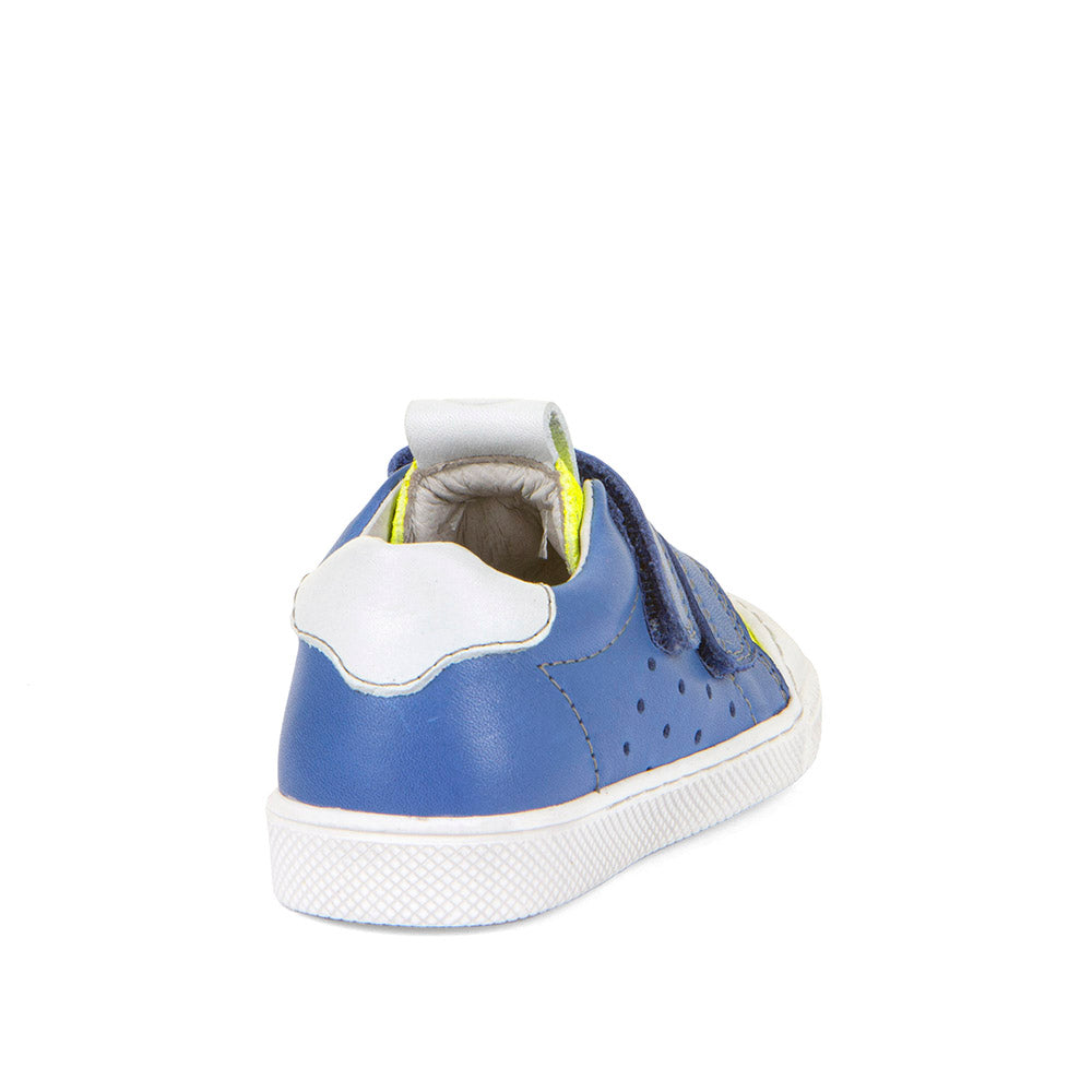 A boys casual shoe by Froddo, style Rosario G2130316-26, in blue and yellow leather with white trim and toe bumper. Velcro fastening. Angled view of back.
