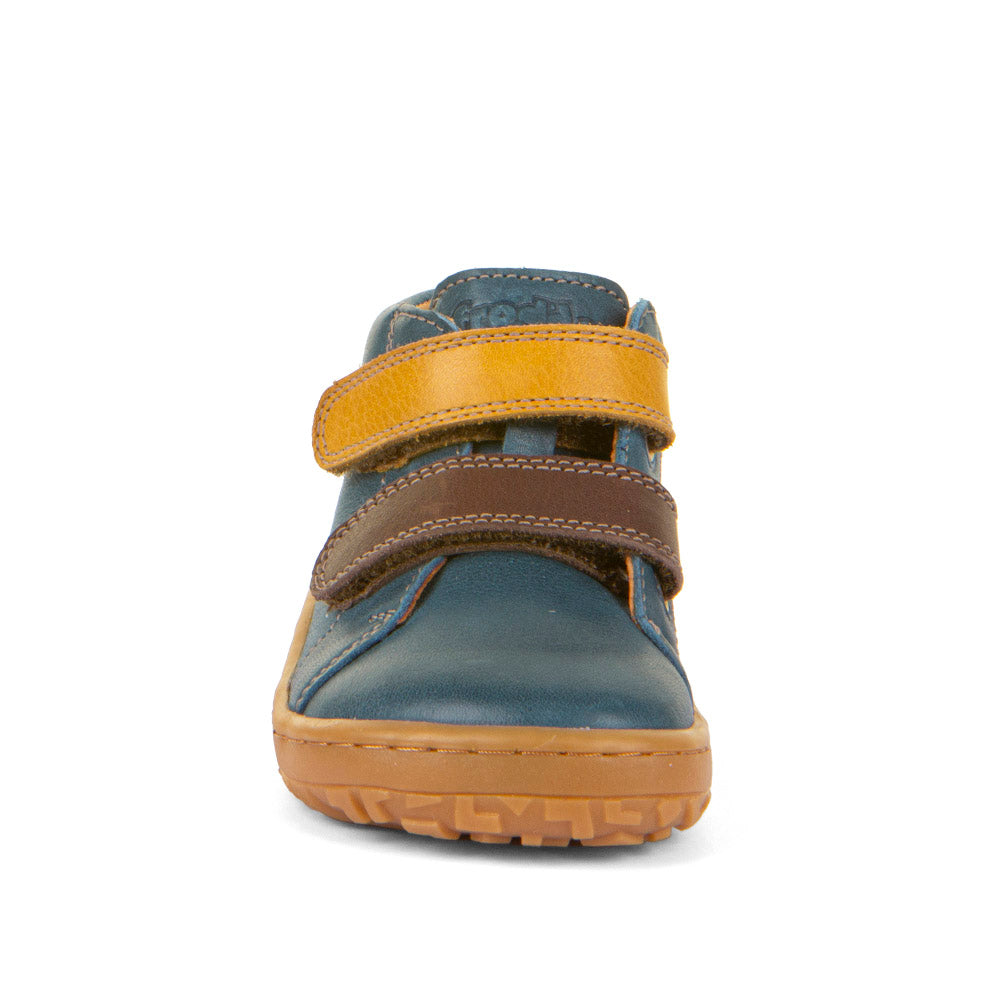 Froddo First Step Barefoot shoe in dark denim with heel and toe bumpers and two yellow and brown velcro straps. Front view