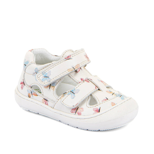 A girls sandal by Froddo, style Ollie Sandal in white with two velcro straps, toe and heel bumpers and butterfly pattern. Angled front view