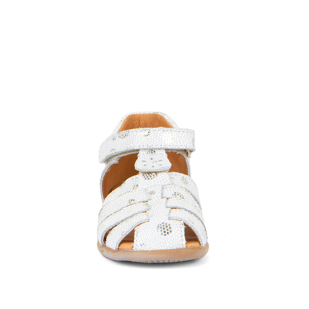 A girls leather sandal by Froddo, style Carte Girly, in White leather with single velcro fastening. Front view.