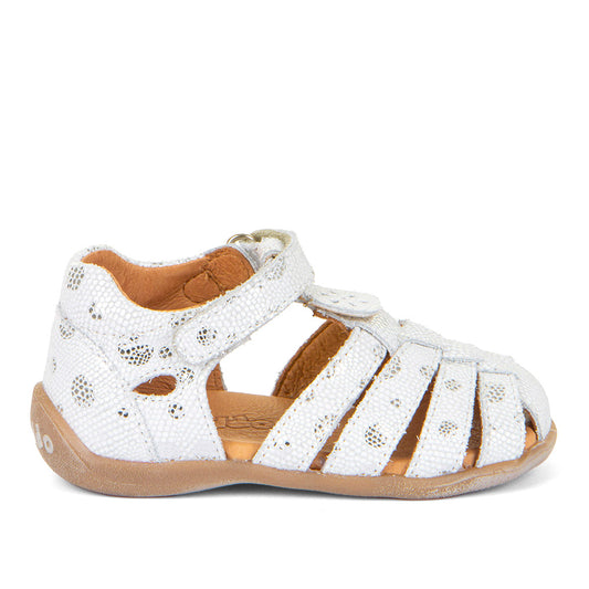 A girls leather sandal by Froddo, style Carte Girly, in White leather with single velcro fastening. Right side view.