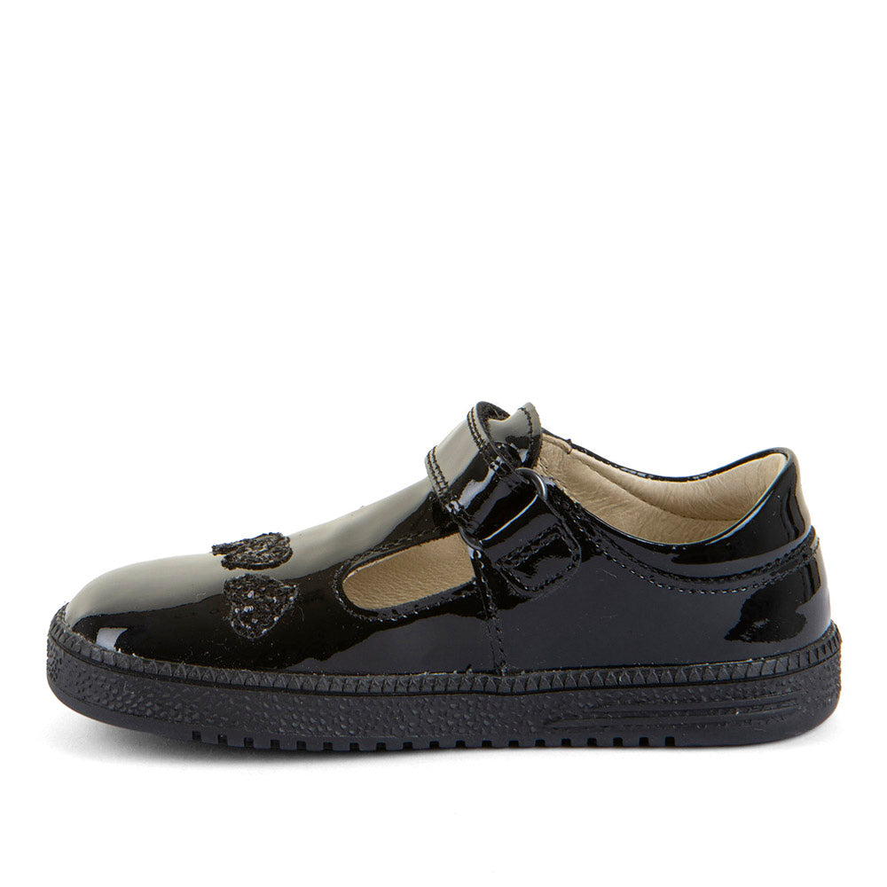 A girls barefoot school shoe by Froddo. In a loop Sandra style, black patent, with a tbar velcro strap and love heart design on the front. Inner right side view.