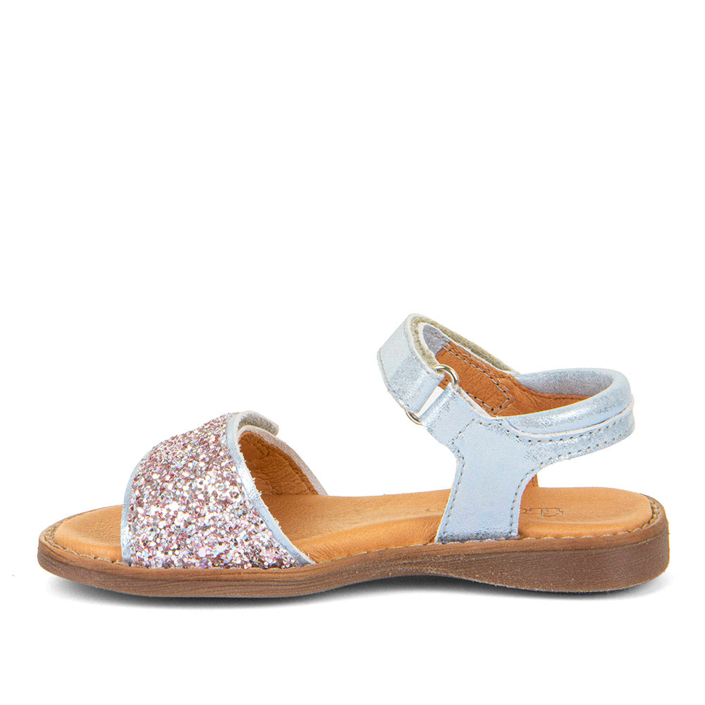 A girl's open toe sandal by Froddo,style Lore Sparkle G3150249-10 in silver leather with Glitter velcro strap and velcro ankle fastening. Left Side view.