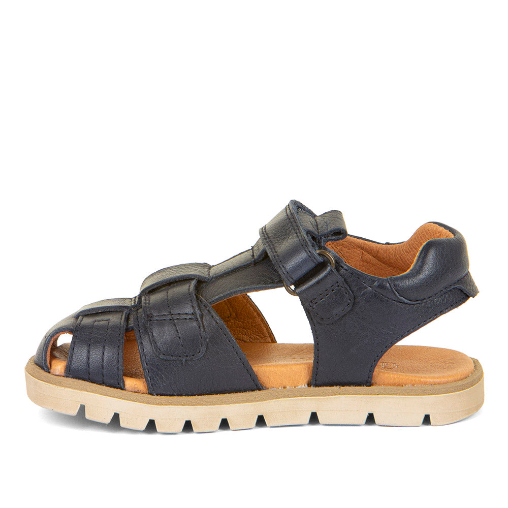  A unisex closed toe sandal by Froddo,style Keko G3150254-1 in navy leather with double velcro fastening. Left Side view.