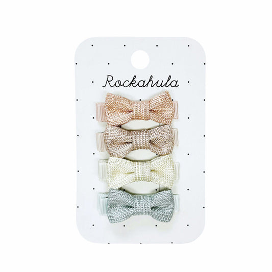 A set of 4 bar clips by Rockahula, style Nordic Shimmer, with bow detail, in grosgrain ribbon pastel colours. Front view.