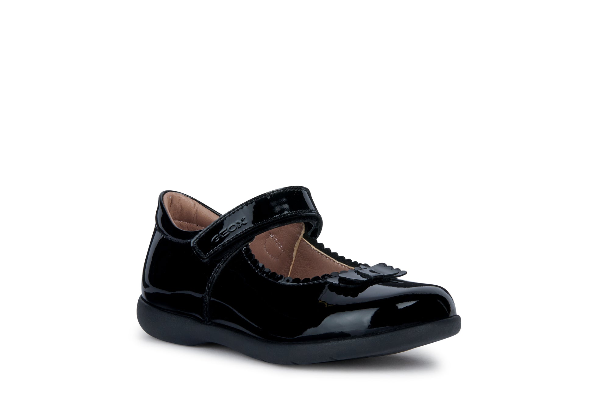 A girls school shoe by Geox, style Naimara in black patent with a velcro strap. Right angled view.