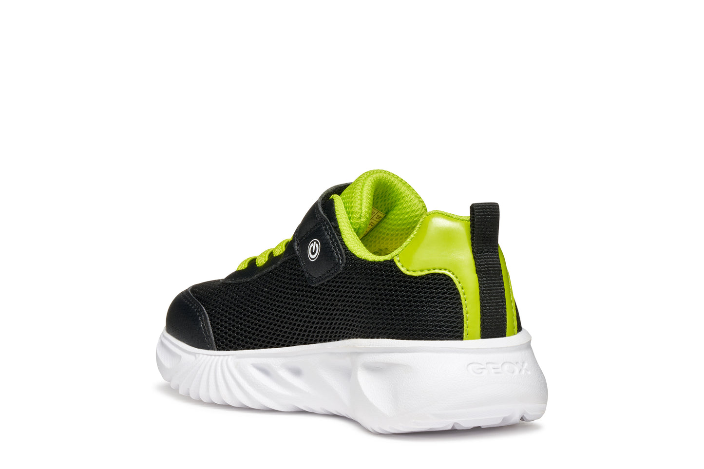 A boys trainer by Geox, style Assister, in black/lime with velcro strap and green laces. Angled left side view.