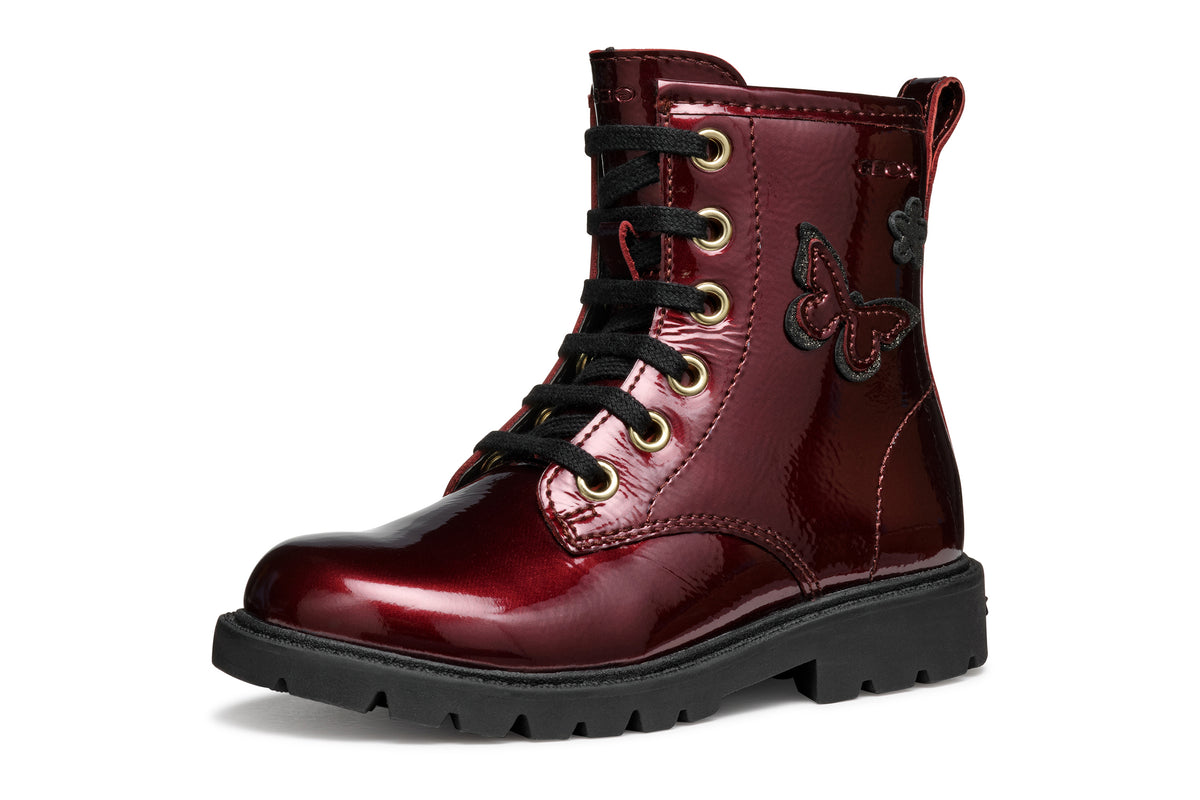 Geox girls patent boot in the style Shaylax in the colour burgundy with black laces, butterfly details and a black sole. Angled left view. 
