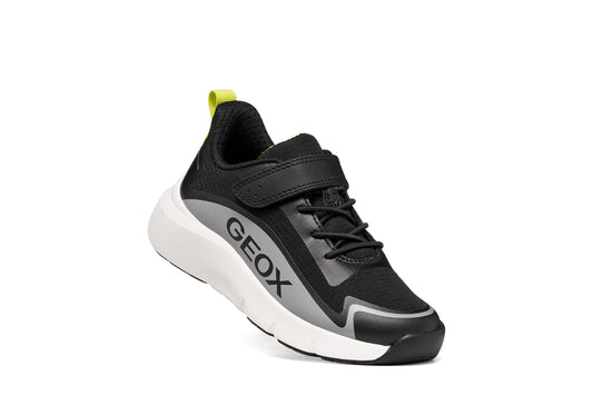 Geox boys trainer in the style Pro-Ran in black, white and grey with a Velcro strap, GEOX logo and white sole. Right side view.