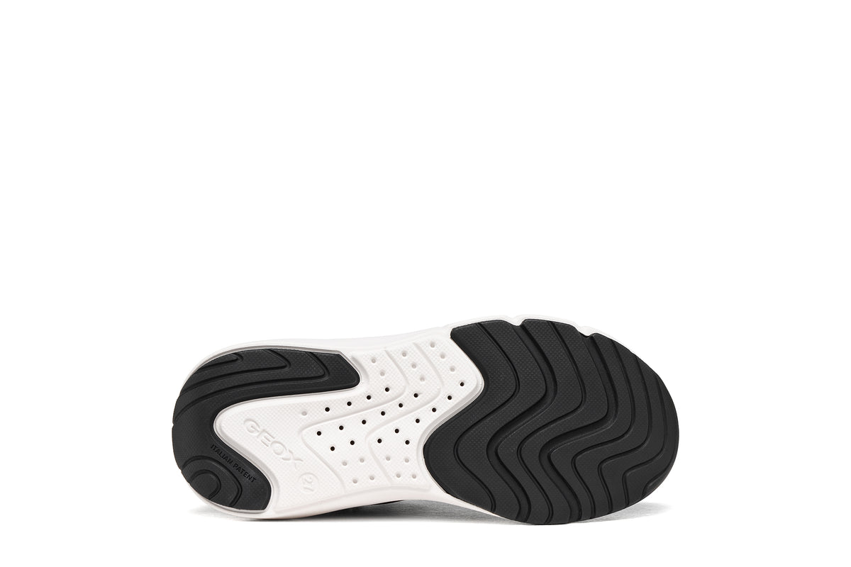 Geox boys trainer in the style Pro-Ran in black, white and grey with a Velcro strap, GEOX logo and white sole. View of sole