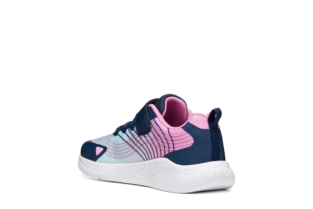 Geox girls trainer in the style Sprintye in navy, pink and white with Velcro strap and white sole. Angled back view of right shoe. 