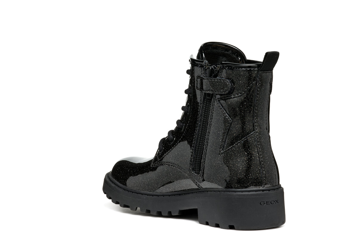 Geox girl's patent ankle boot in the style Casey Girl, with laces, side zip fastening, glitter details all over and chunky black sole. Angled back view.
