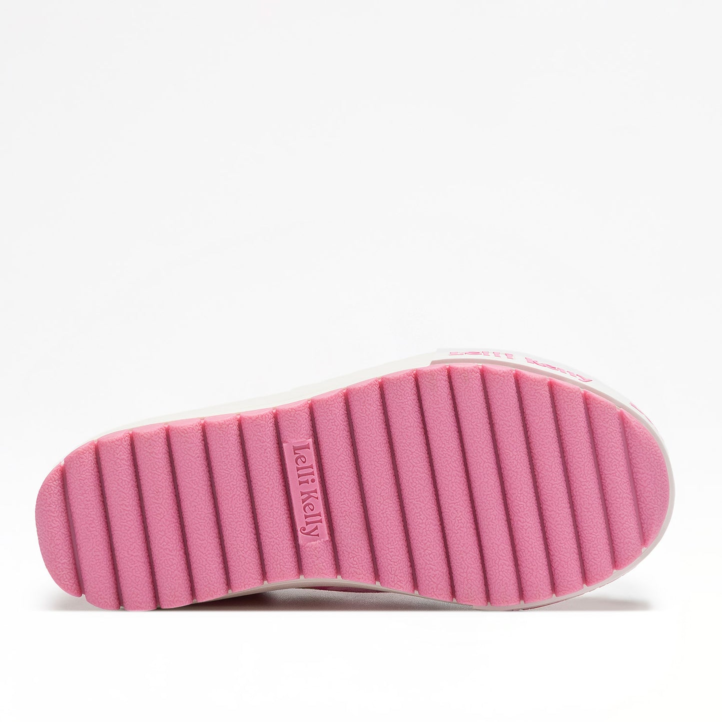 A girls casual shoe by Lelli Kelly, style Eloise Dolly in Fuxia Fantasia. Colourful flower design with stitched flower detailing, velcro strap and pink sole. View of sole
