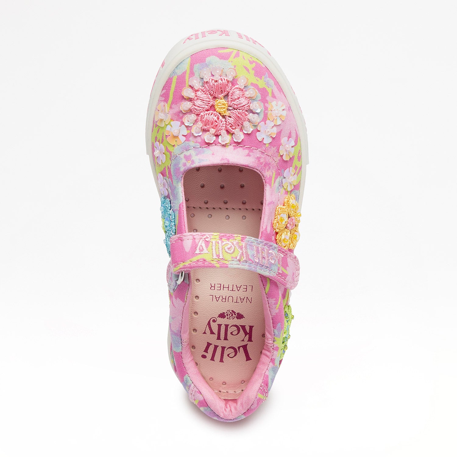 A girls casual shoe by Lelli Kelly, style Eloise Dolly in Fuxia Fantasia. Colourful flower design with stitched flower detailing, velcro strap and pink sole. Top view