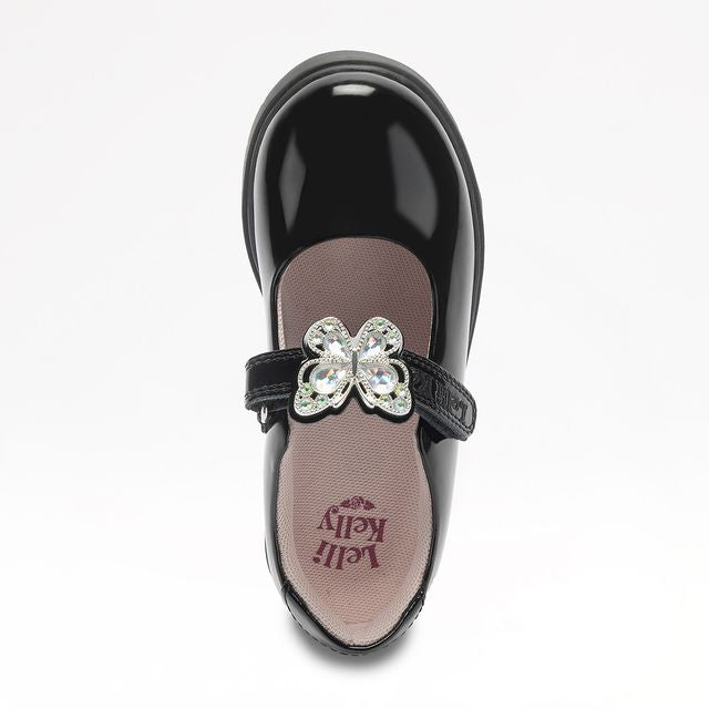 A girls Mary Jane school shoe by Lelli Kelly, style LKSO8964CVR Selena, in black patent with detachable butterfly embellished attachment. Velcro fastening. Above view.