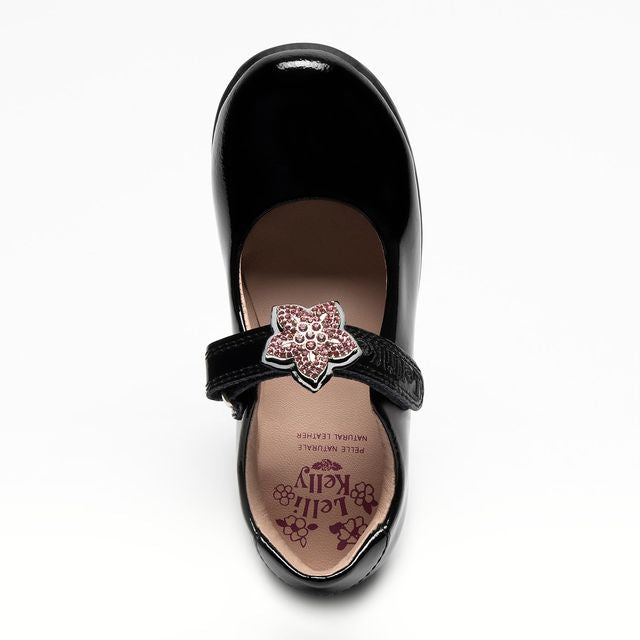 A girls Mary Jane school shoe by Lelli Kelly, style LKSO8471CVR Daisy, in black patent with detachable daisy embellished attachment. Velcro fastening. Above view.