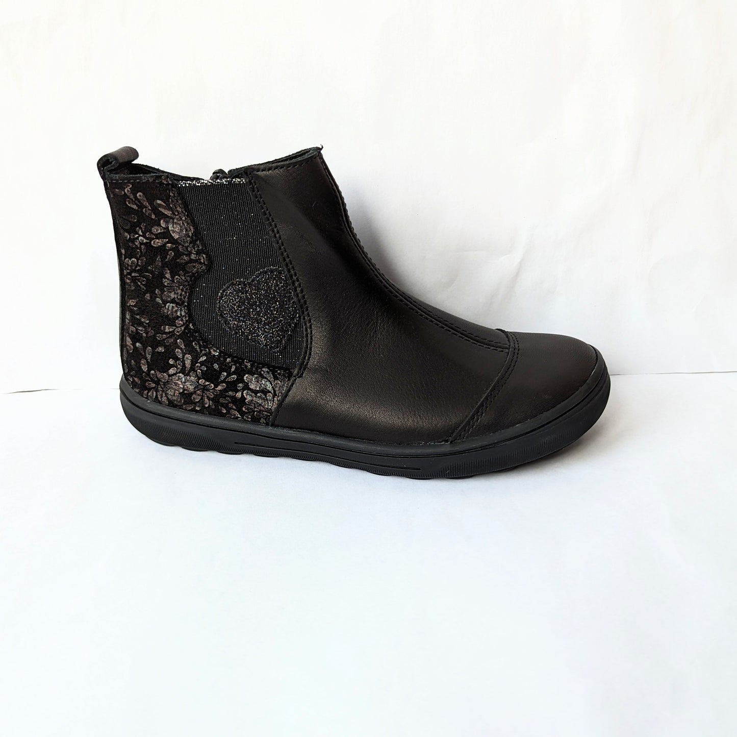 A girls ankle boot by Bopy, style Sonate, in black leather/black gold print nubuck with elastic gusset and zip fastening. Right side view.
