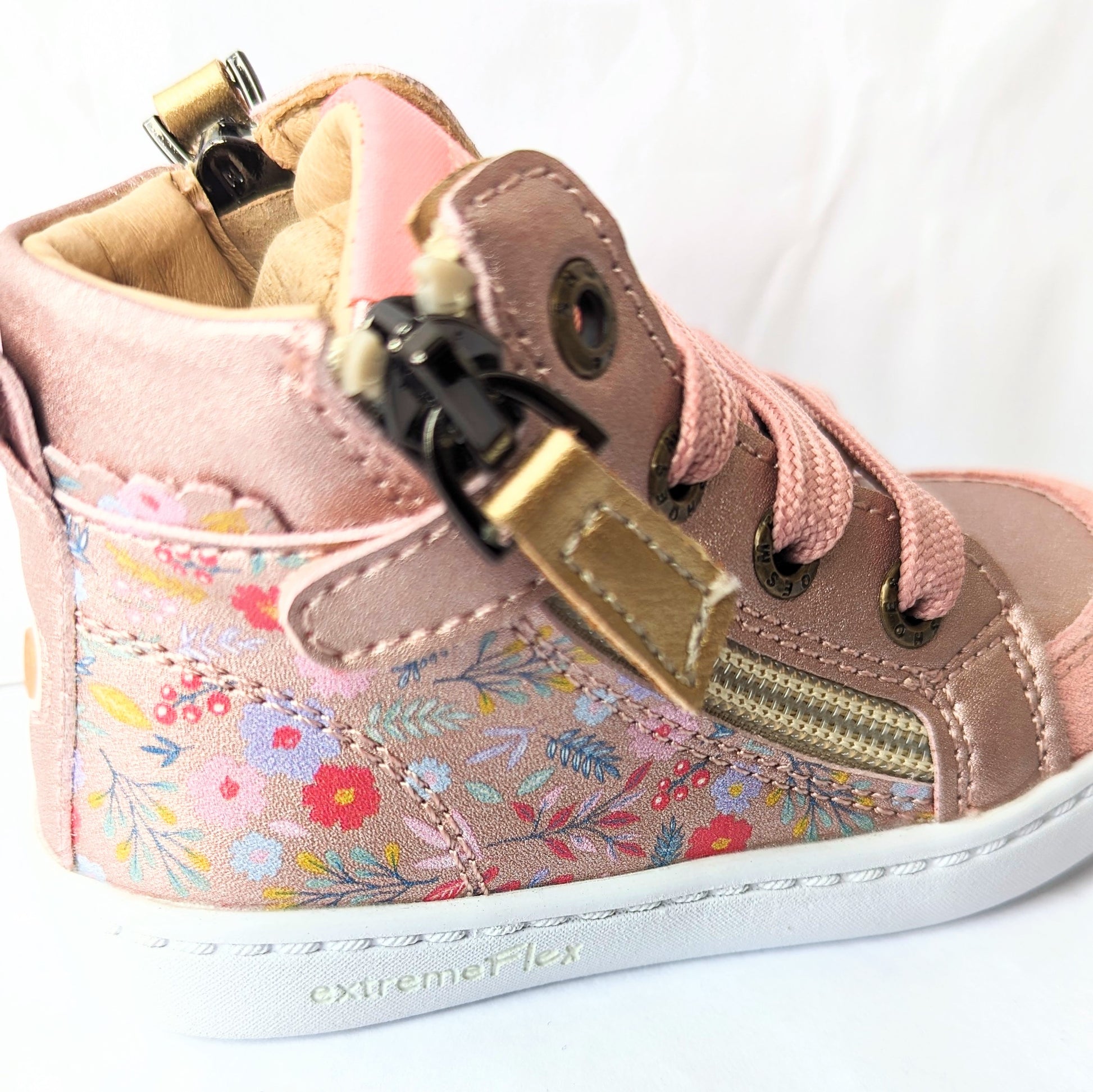 A girls hi-top boot by Shoesme, style FL23W008-B, in rose gold floral leather and suede with detachable teddy bear and lace and zip fastening.  Close up of zip fastening.