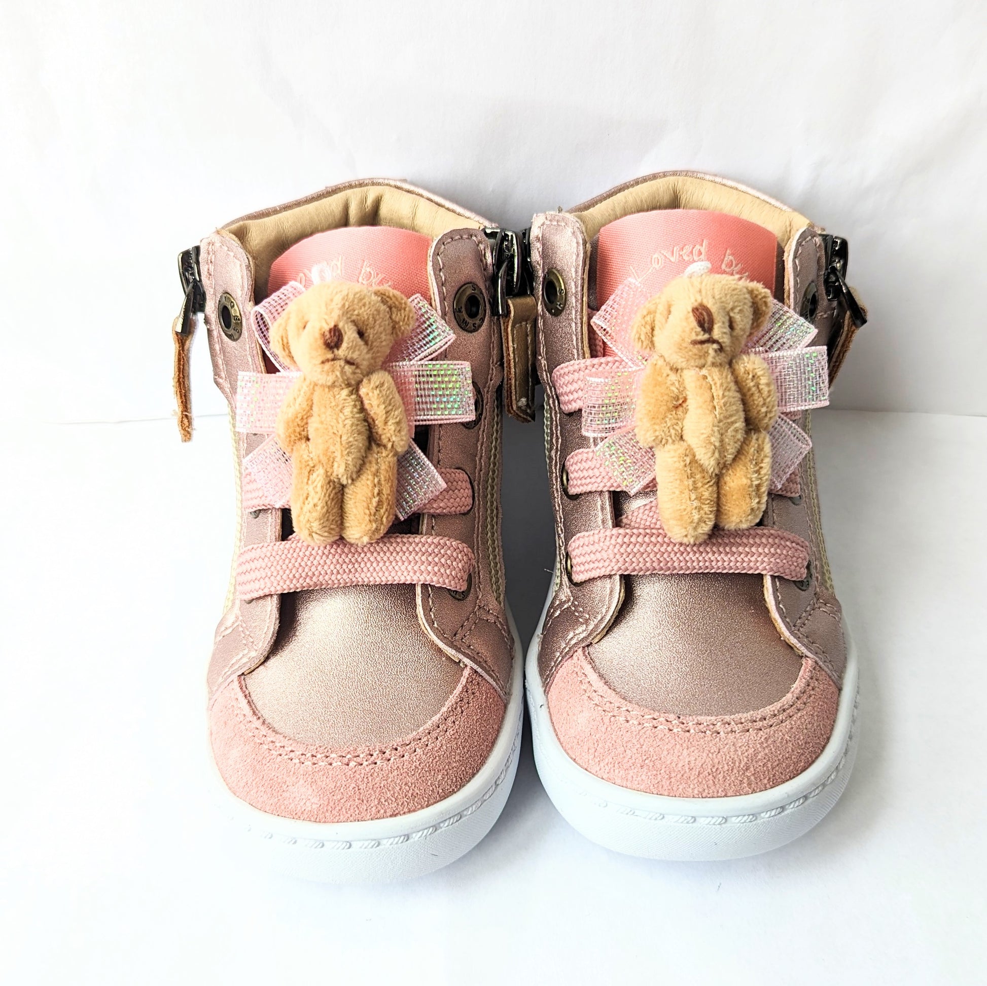A pair of girls hi-top boots by Shoesme, style FL23W008-B, in rose gold floral leather and suede with detachable teddy bears and lace and zip fastening. Front view of pair.