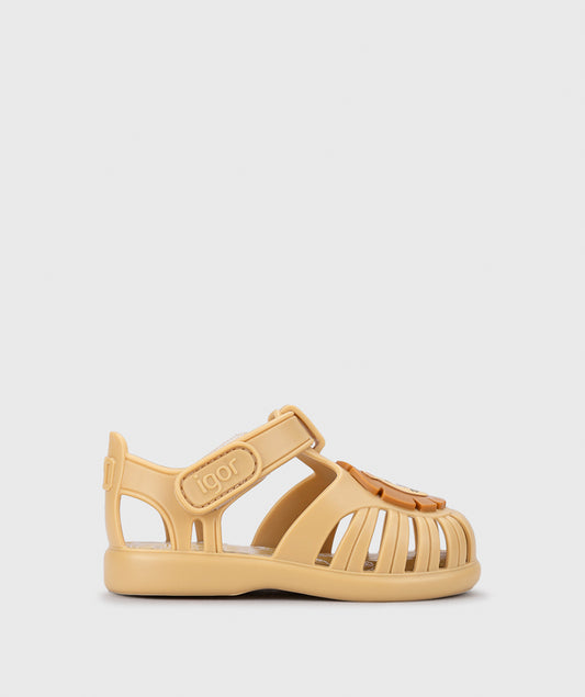 A unisex jelly shoe by Igor, style Tobby Leon in Dijon with velcro strap and lion design on front. Right side view