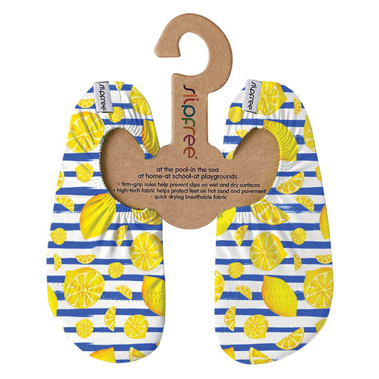 A girls non slip swim shoe by Slipfree, style Cello, in Royal Blue and White stripes with lemon print. Front view.