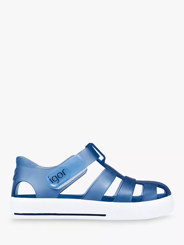 A unisex closed toe jelly shoe by Igor, style Star, in marino blue and white with velcro fastening. Right side view.