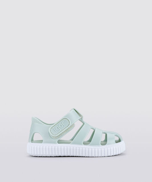 A unisex Jelly shoe by Igor , style Nico in mint green with white sole, velcro fastening. Right side view.